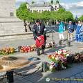 A ceremony at the Memorial Flame of the Arc de Triomphe